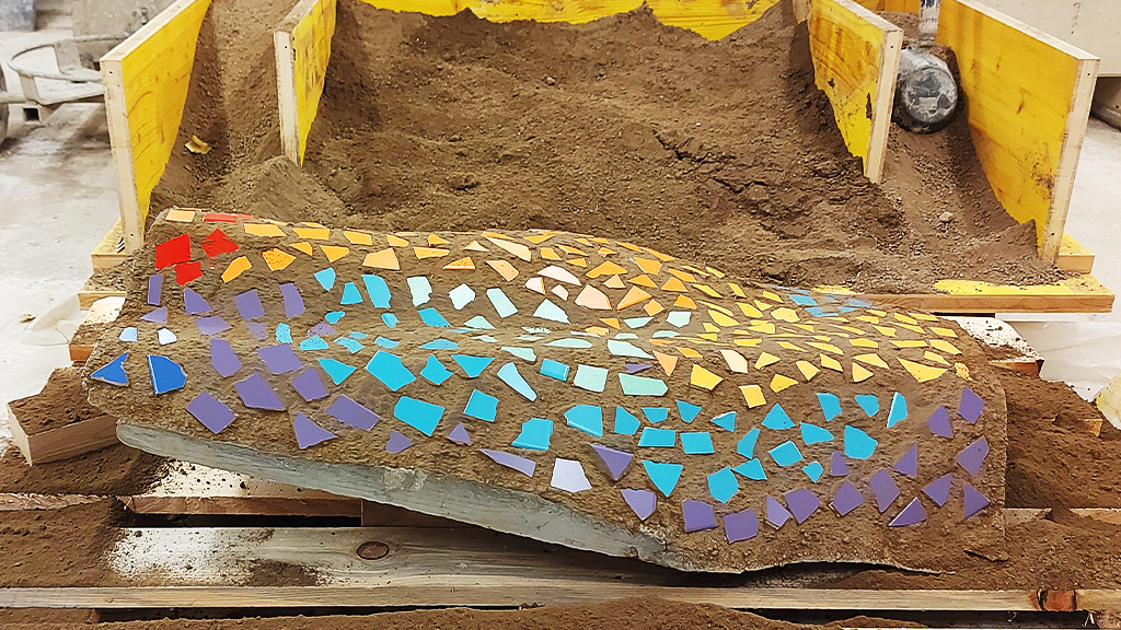 Upcycled Tiles: Robotic Mosaic in Earth Formwork